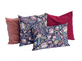 Multicolored flower print cushion set with salmon and red velvet.